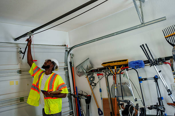 Professional Garage Door Panel Replacement technician working in McAlester, OK